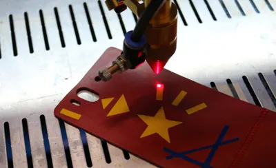MARCut: Marker-based Laser Cutting for Personal Fabrication on Existing Objects