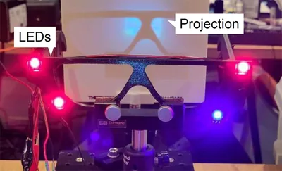 BeamStellar: Low-Latency, 6-DoF Head Tracking for Beaming Displays with Spatio-Temporal LED Encoding